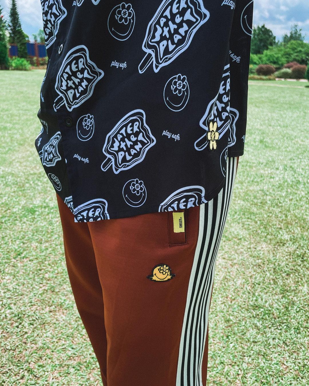 MELTING SMILEYWORLD®TRACK PANTS | BROWN